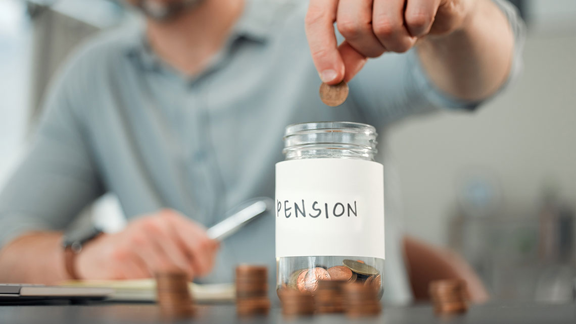 Man putting money into a jar labeled pension.