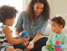 Parent spending time with children while managing child-related responsibilities after divorce