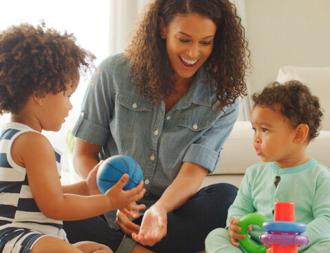 Parent spending time with children while managing child-related responsibilities after divorce