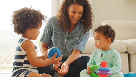 Parent spending time with children while managing child-related responsibilities after divorce