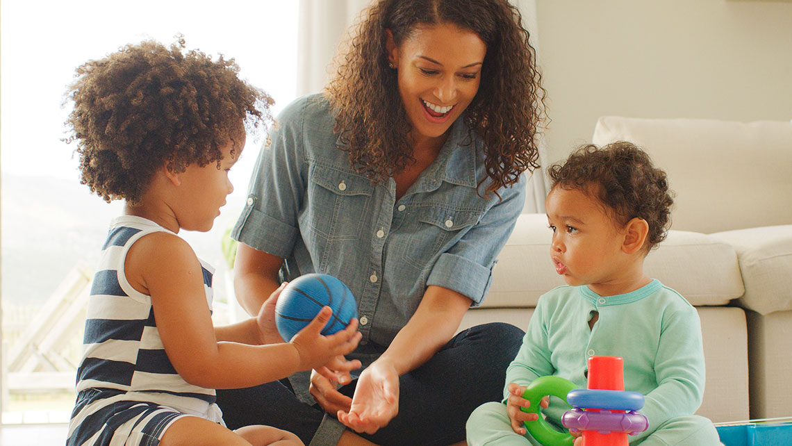 Parent spending time with children while managing child-related responsibilities after divorce