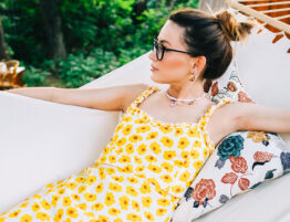 Woman relaxing in a hammock while reflecting on financial planning and divorce strategy during the summer months